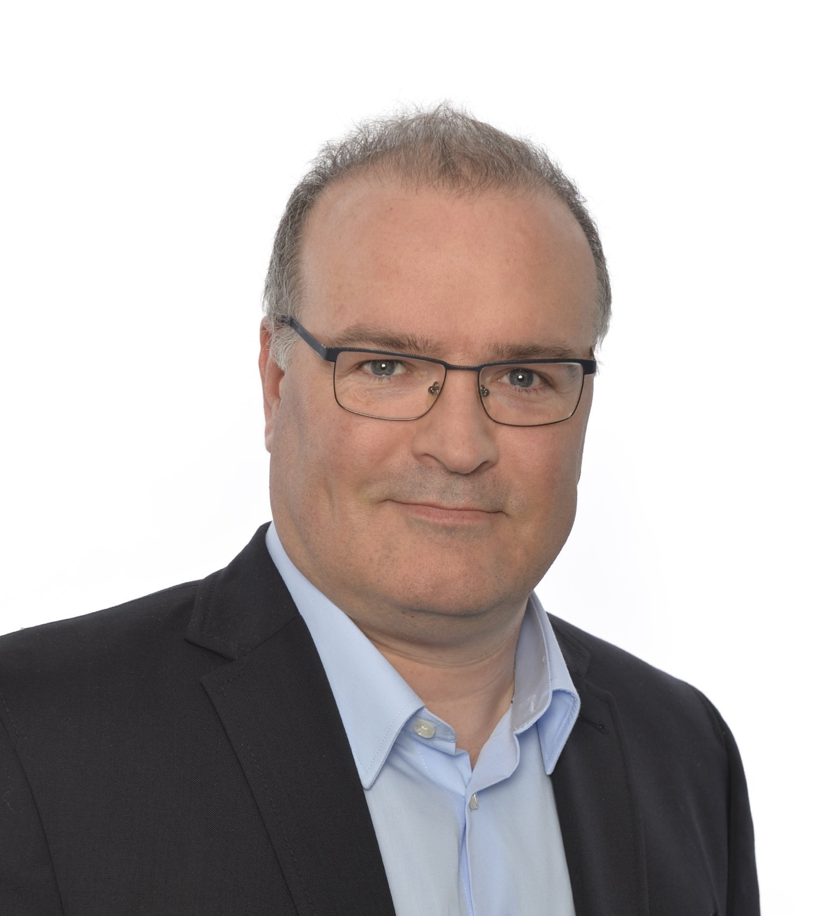 Portrait of Thomas Marti, Bauingenieur, Leiter Vermessung, Jauslin Stebler AG